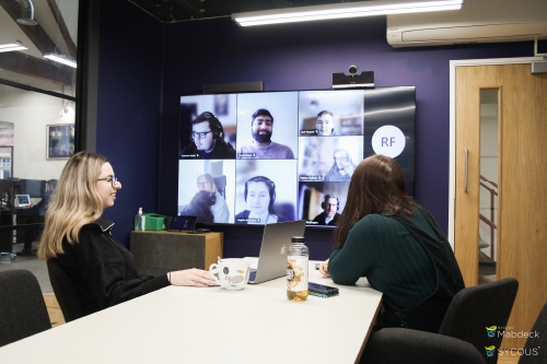 Sycous testers in a meeting